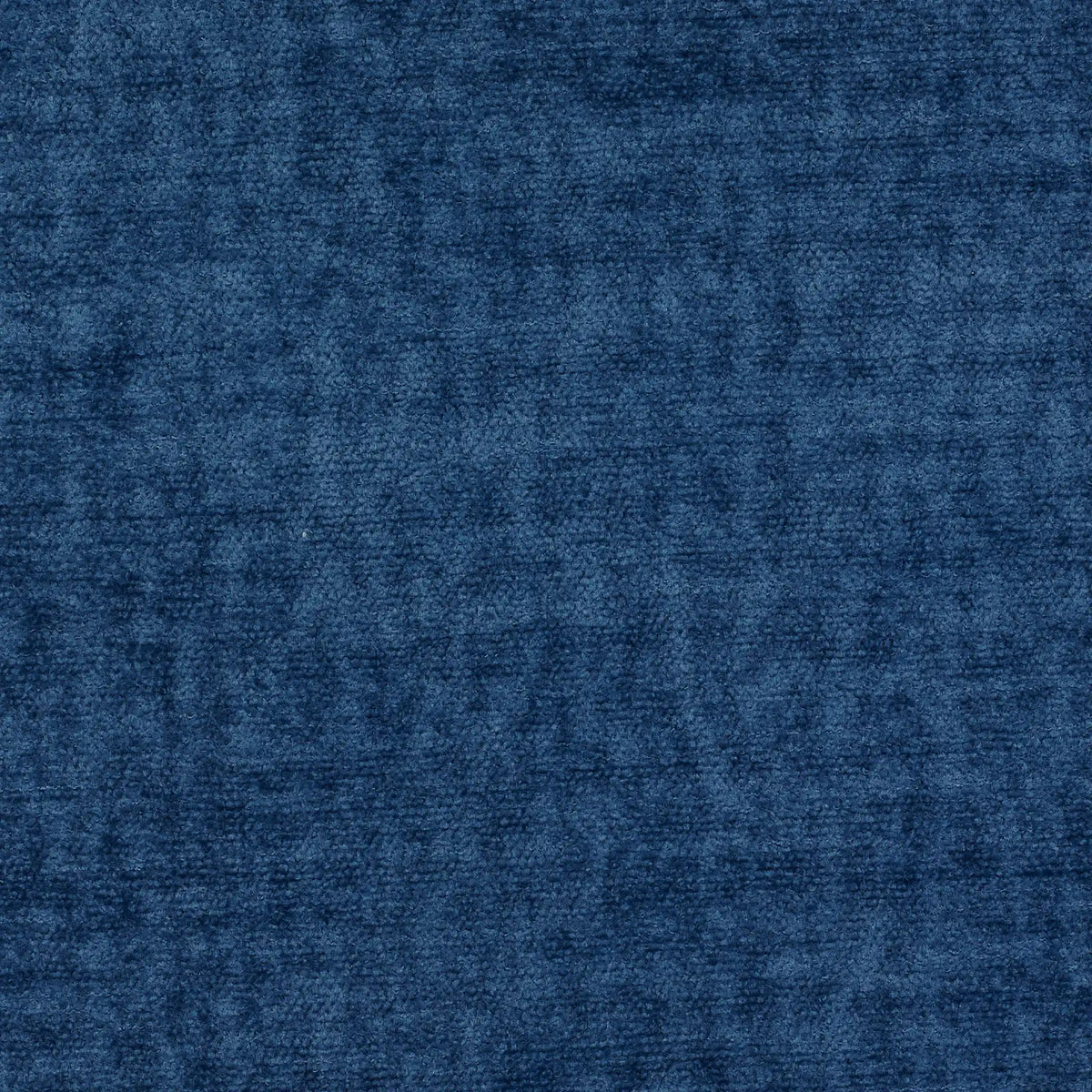 Un primo piano del tessuto blu navy a trama fitta e a pelo corto utilizzato per la personalizzazione del modello T39 ALIBI, caratterizzato da una trama a rilievo con sottili variazioni di tonalità che conferiscono un aspetto morbido e vellutato.