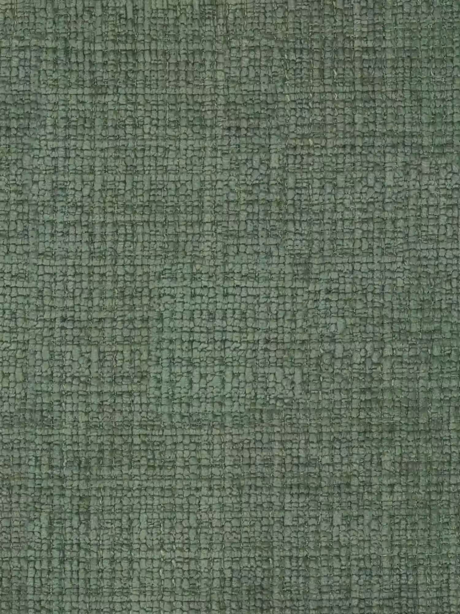 Una vista ravvicinata del tessuto in ciniglia certificato OEKO-TEX® della poltrona imbottita Dafne in legno massello di rovere naturale di Divani.Store, che presenta un effetto materico a motivo a griglia, ideale per gli spazi contemporanei.