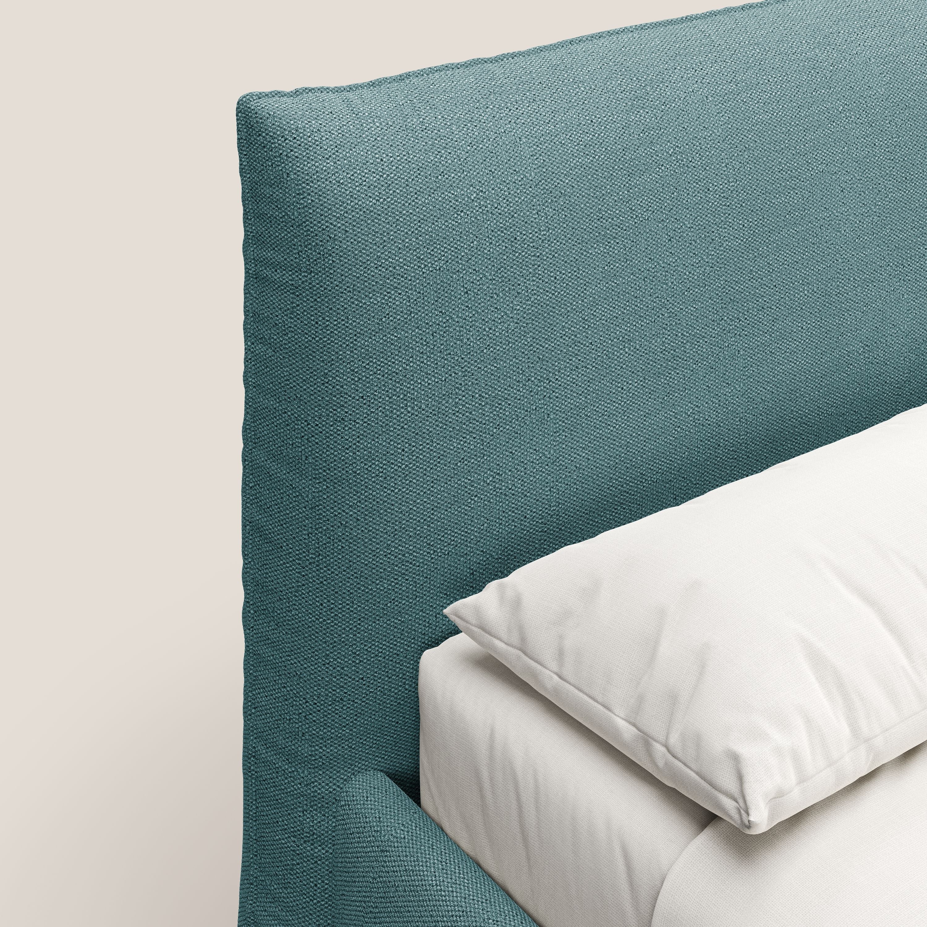 EROS letto imbottito in piuma con vano contenitore in pregiato e fresco bouclet smacchiabile T16 azzurro - divani.store