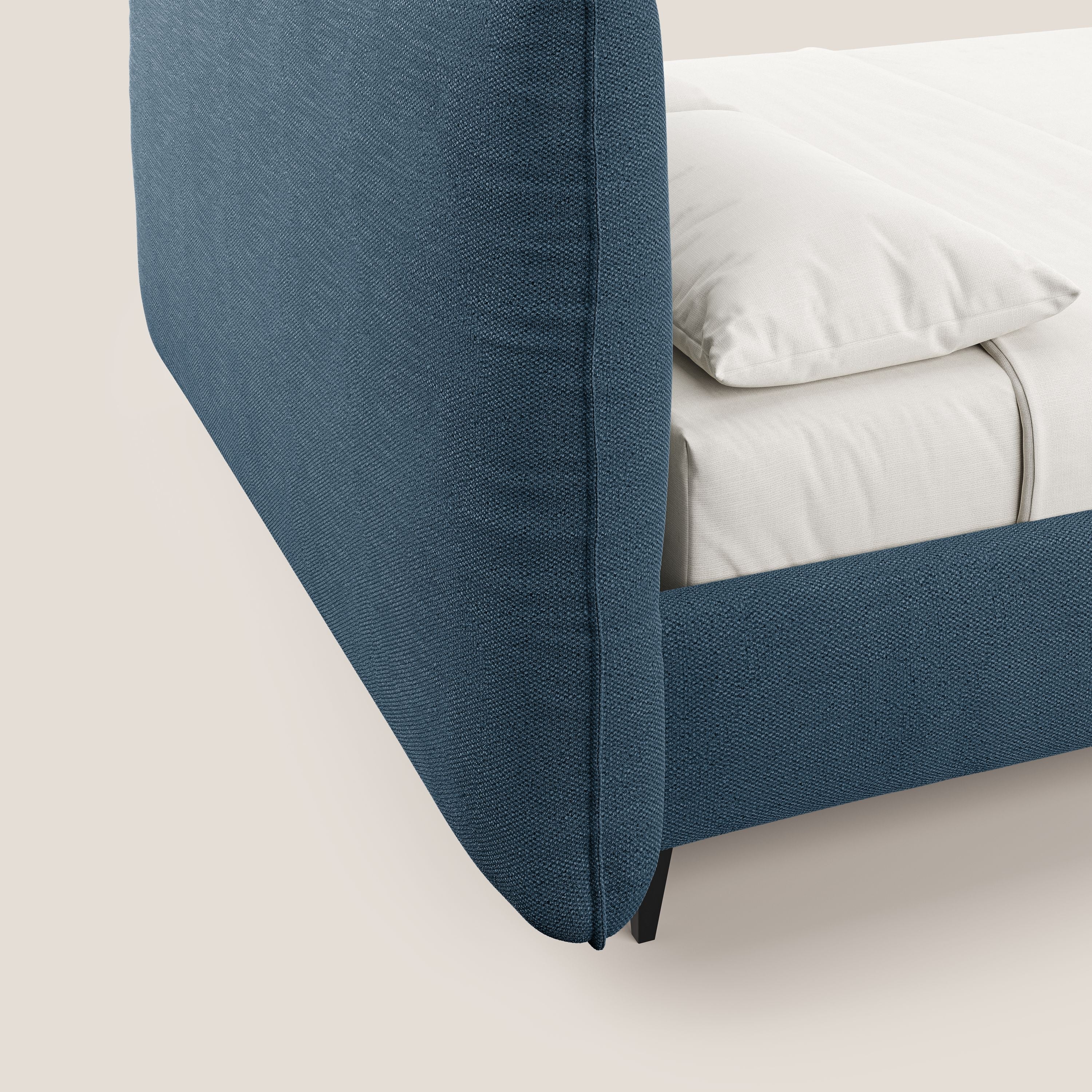 EROS letto imbottito in piuma con vano contenitore in pregiato e fresco bouclet smacchiabile T16 blu - divani.store