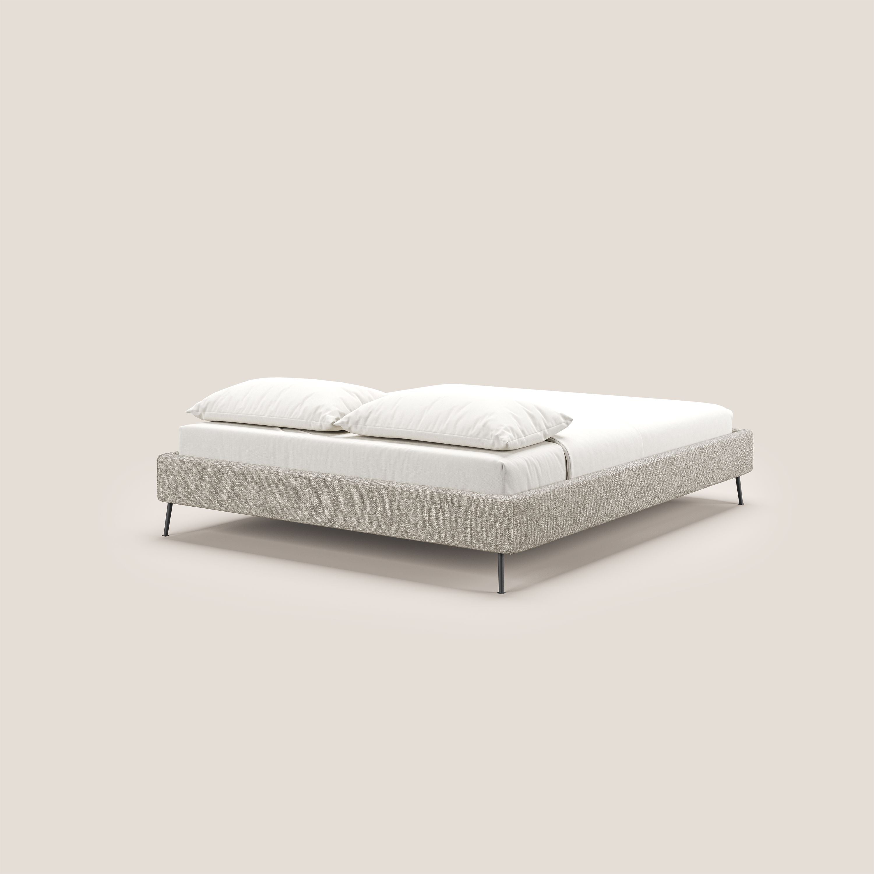 Steve sommier giroletto piedi alti in tessuto impermeabile T10 panna - divani.store