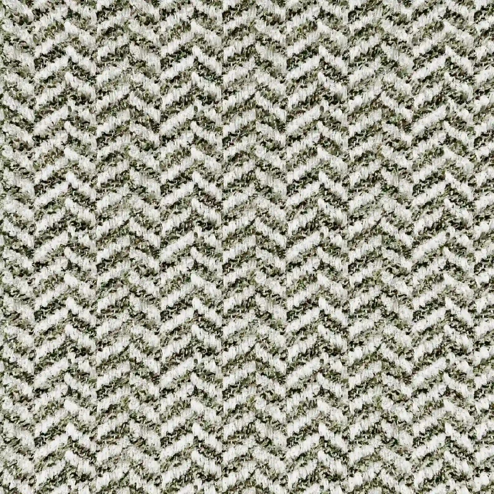 Primo piano del cuscino Sorrento 45x45 in lino di Divani.Store: il tessuto a spina di pesce grigio e bianco crea un effetto materico e intrecciato. L’illuminazione mette in risalto l’elegante motivo, ideale per conferire un tocco di eleganza naturale al vostro arredamento.
