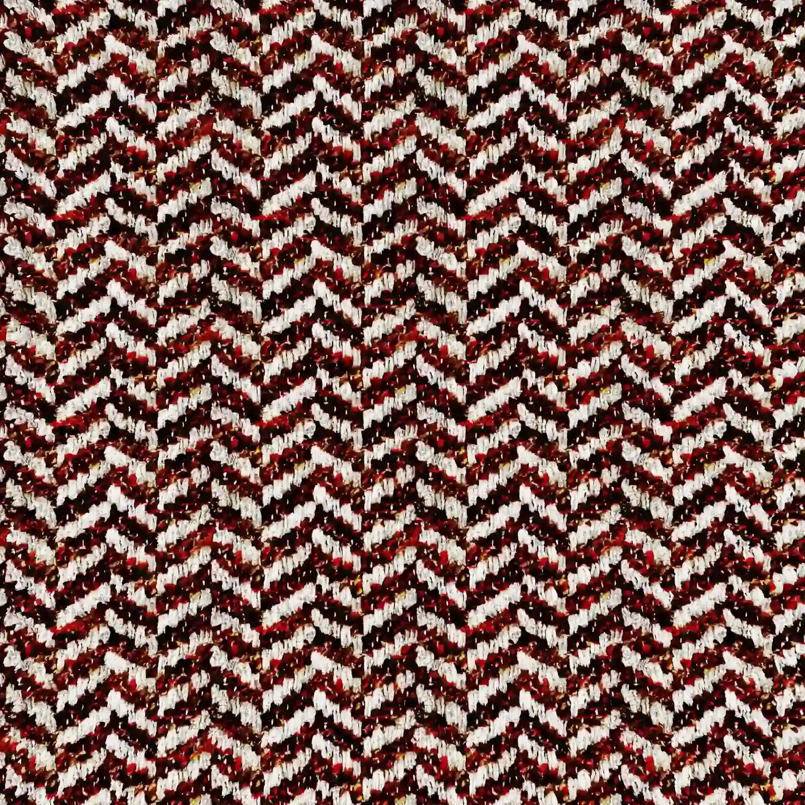 Un'immagine dettagliata del cuscino Sorrento 45x45 in lino di Divani.Store mette in risalto il suo motivo a chevron nei colori rosso, nero, bianco e beige, che crea un dinamico effetto a spina di pesce grazie alle fibre di lino testurizzate e leggermente in rilievo.