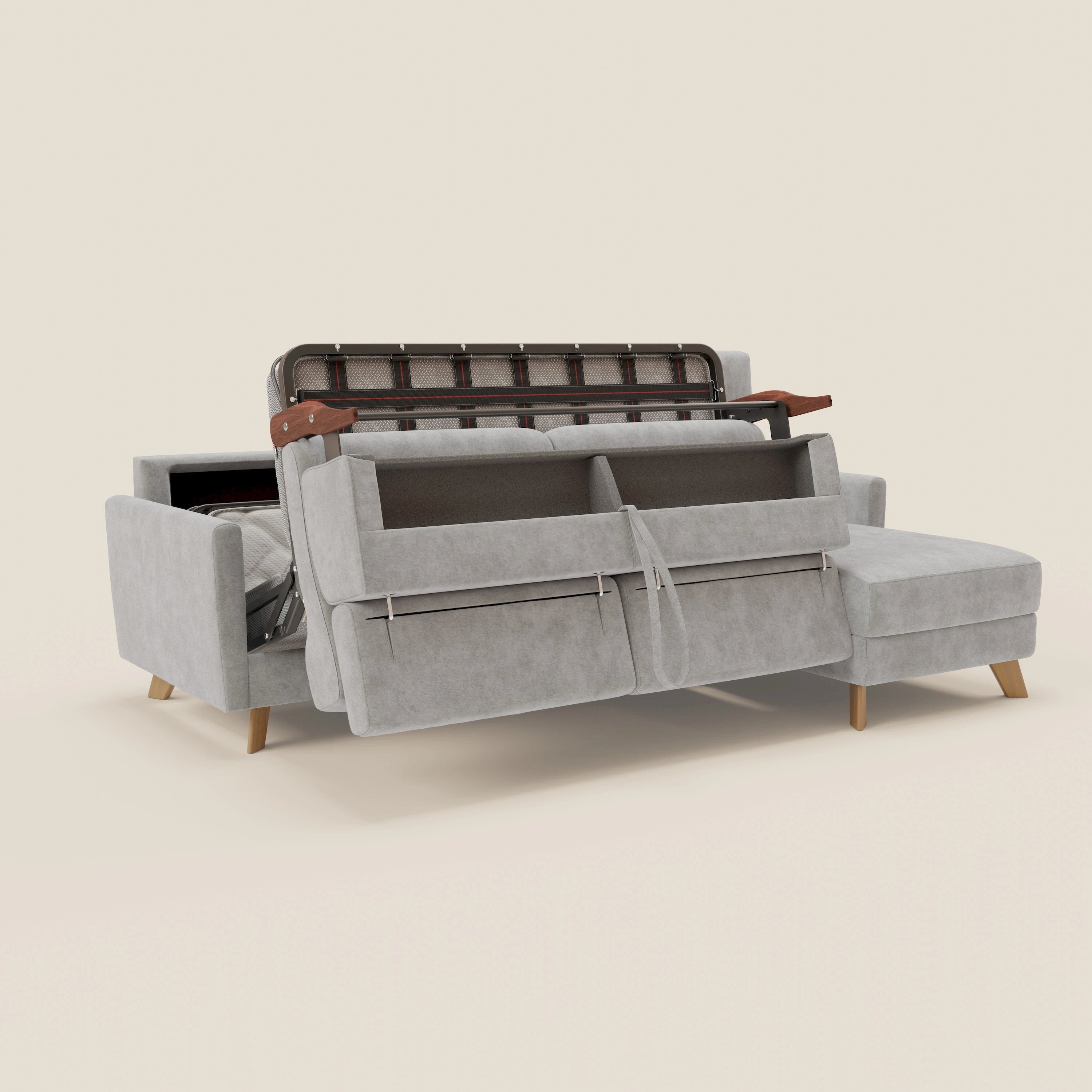 Il divano letto angolare sfoderabile Francy di Divani.Store in tessuto smacchiabile T17 grigio è caratterizzato da una penisola contenitore e da poggiatesta reclinabili, che uniscono lo stile nordico alla praticità, su un morbido sfondo beige.