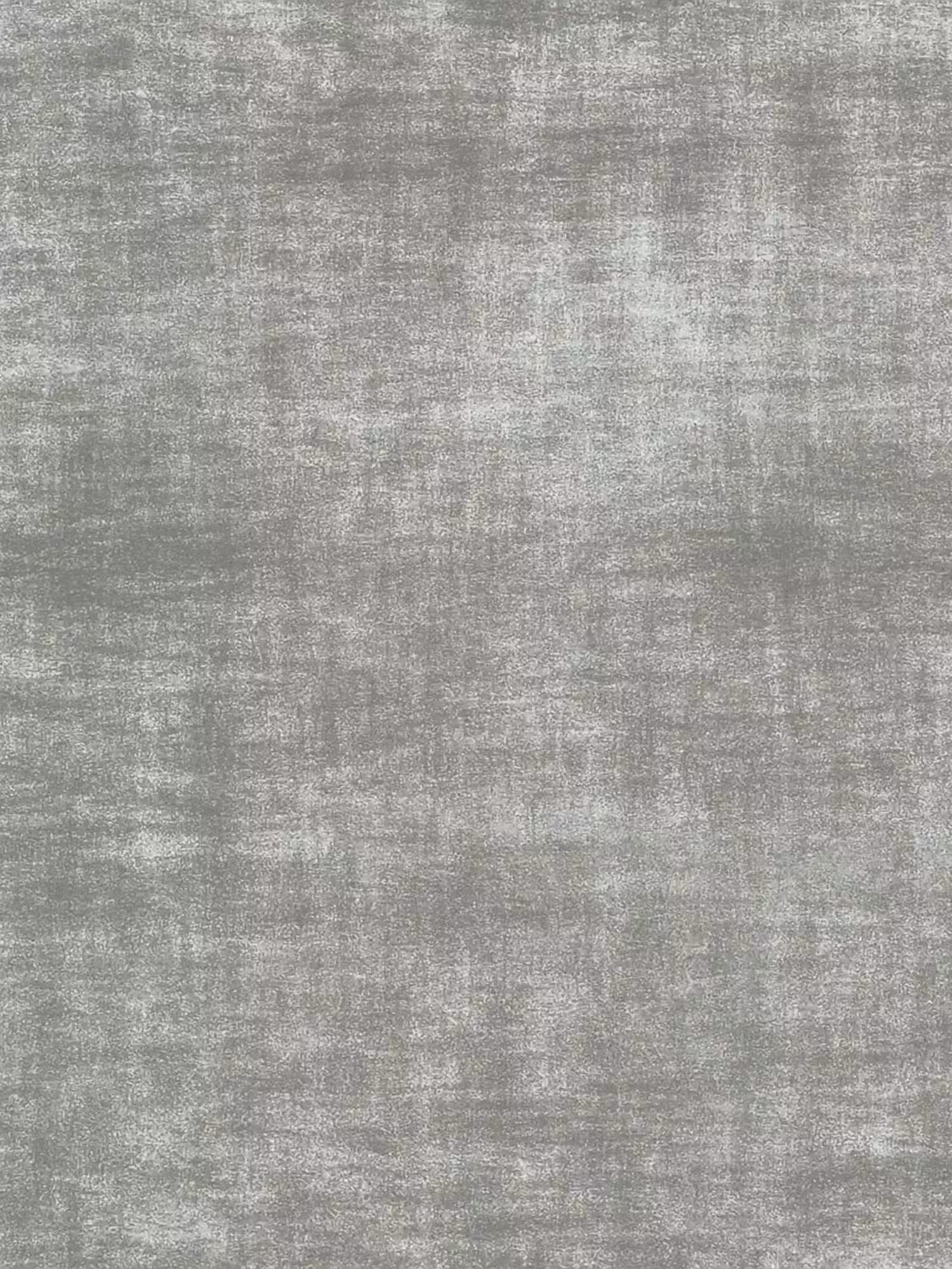 Una superficie morbida, di colore grigio screziato, con una trama uniforme che richiama quella del tessuto, evoca l’aspetto del rivestimento in ciniglia, caratterizzato da sottili variazioni di tonalità che creano un effetto delicatamente invecchiato — proprio come il rivestimento in ciniglia certificato Oeko-Tex® dei modelli Letti.Il letto imbottito AURO del negozio, con contenitore e testiera capitonné alta. Nel motivo non sono presenti forme o oggetti distinti.
