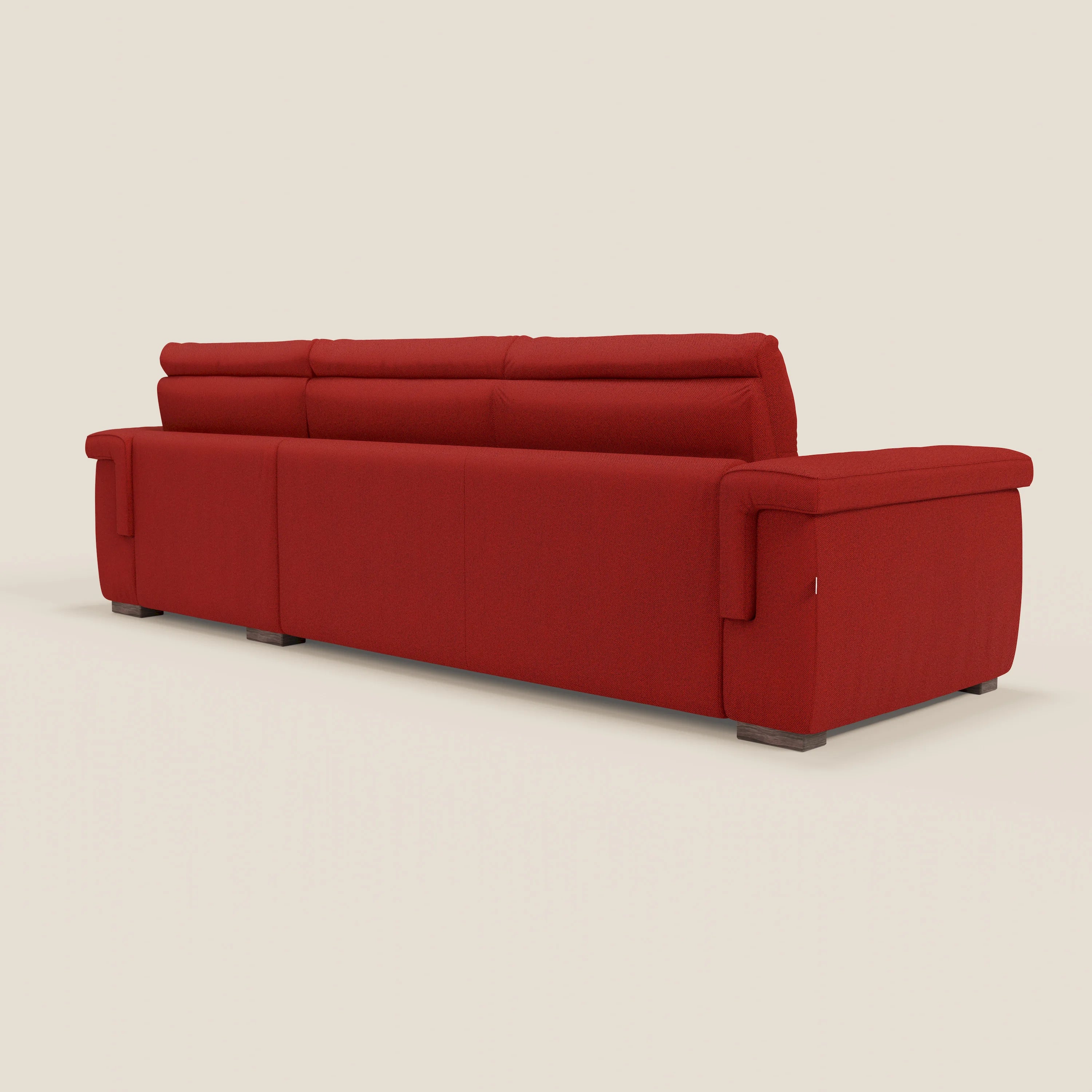 Il divano letto angolare Magnolia con penisola contenitore di Divani.Store è presentato in rosso da un angolo dello schienale, con cuscini morbidi, ampi braccioli, linee pulite e gambe corte e scure, ideale per un comfort contemporaneo e audace.