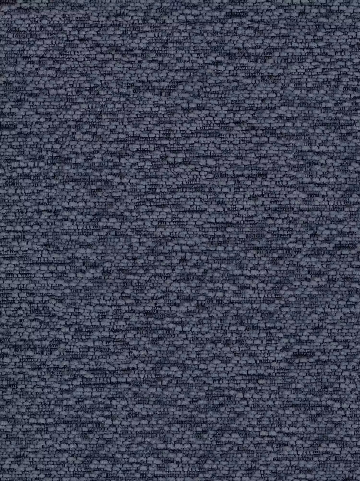 Primo piano di una parete in pietra con texture, composta da piccole pietre grigie di forma irregolare accuratamente incastrate tra loro per creare una superficie ruvida ma omogenea. Le sottili variazioni di dimensioni e tonalità conferiscono alla parete un fascino naturale e rustico, in grado di esaltare magnificamente le linee pulite del letto di design VALKIRIA con vano contenitore e testiera avvolgente - 2 cuscini imbottiti e tessuto Oeko-Tex® di Letti.store oppure di aggiungere profondità a un