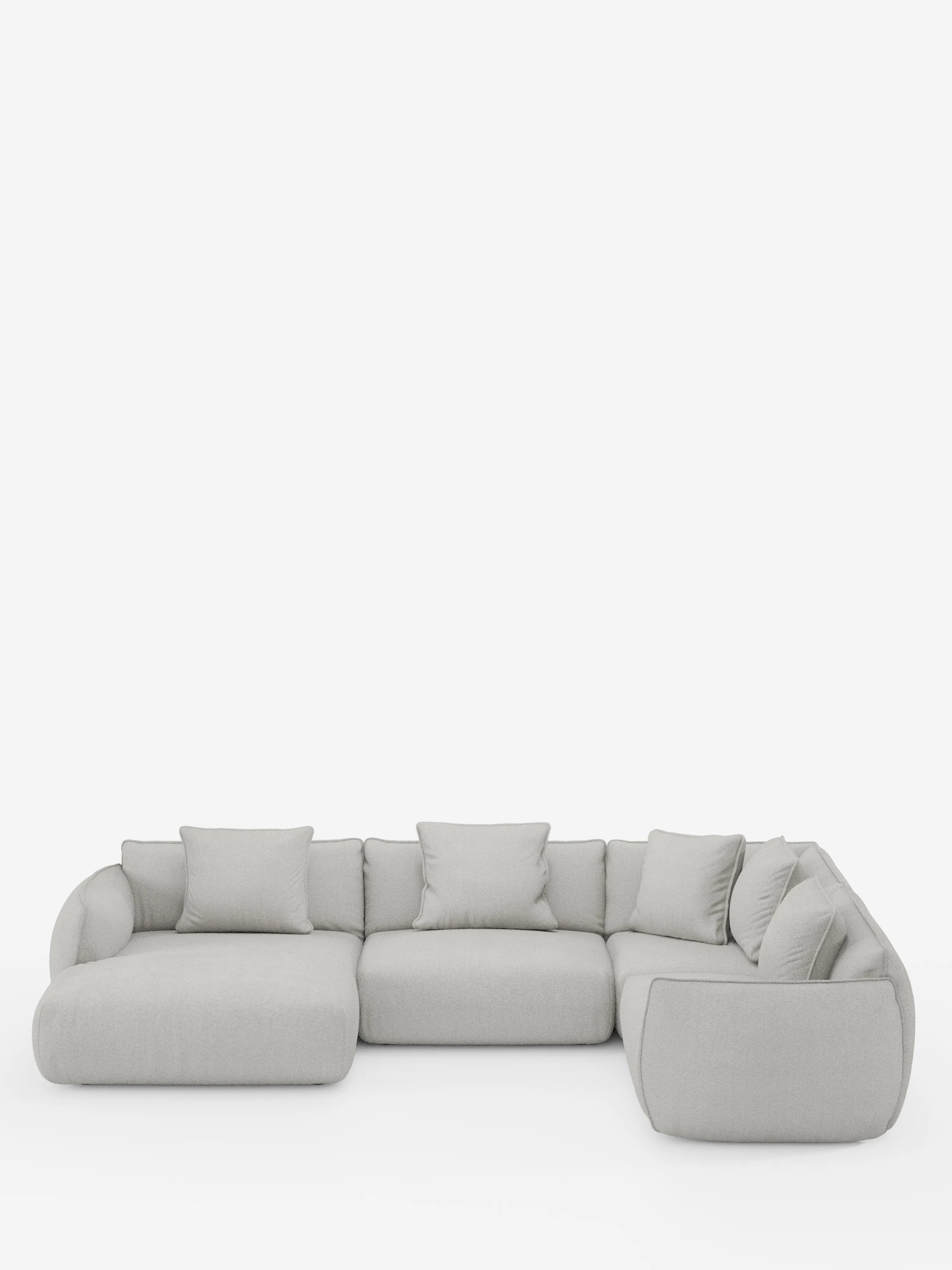 Il divano angolare panoramico componibile Nimbus con penisola e angolo in tessuto smacchiabile t33 di Divani.Store si presenta con un design moderno in grigio chiaro e morbidi cuscini disposti a forma di L. Questo divano componibile è caratterizzato da uno schienale basso, ampi braccioli e una silhouette morbida e minimalista che risalta su uno sfondo bianco a tinta unita. Cinque cuscini quadrati coordinati completano l’elegante composizione.