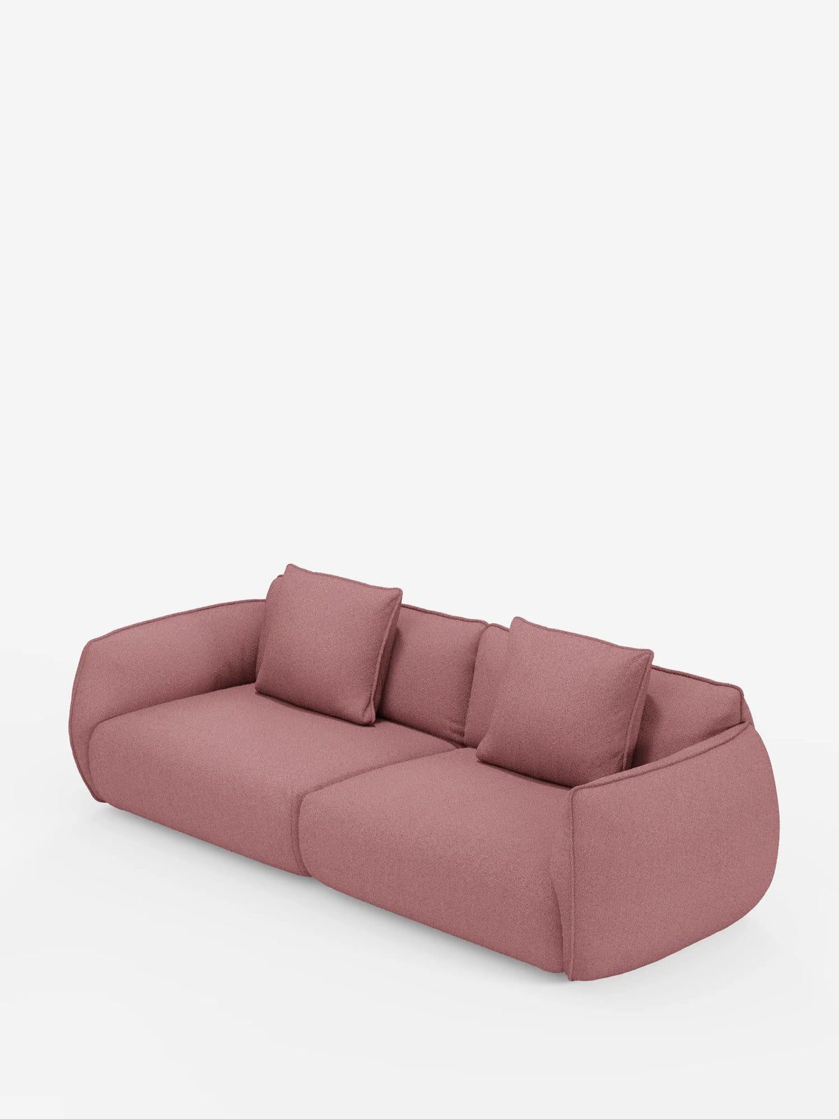 Un divano modulare e componibile Nimbus a 3 posti in rosa malva contemporaneo di Divani.Store, lungo 250 cm e rivestito in tessuto sfoderabile e antimacchia con effetto cotone (t33). Il divano presenta bordi morbidi e arrotondati, braccioli bassi, due cuscini di seduta e quattro morbidi cuscini dello schienale abbinati. Lo sfondo è bianco a tinta unita.
