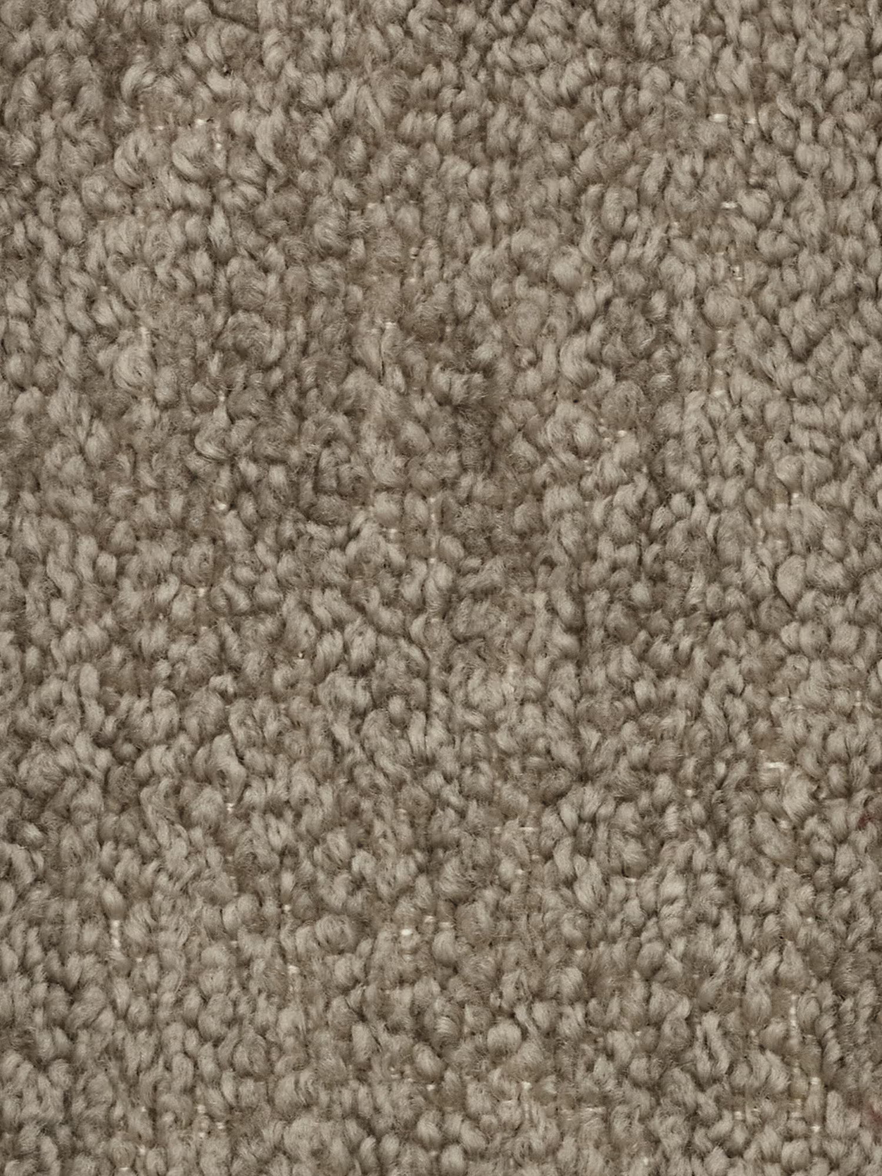 Primo piano del divano componibile a 3 posti “Mosaic” in bouclé di Divani.Store, caratterizzato da fibre ad anello molto fitte nei toni del beige e del marrone chiaro che ricordano il tessuto bouclé. Il tessuto smacchiabile T21 presenta una superficie leggermente irregolare con sottili variazioni di colore su tutta la superficie; nell'immagine non sono visibili motivi distinti né macchie.