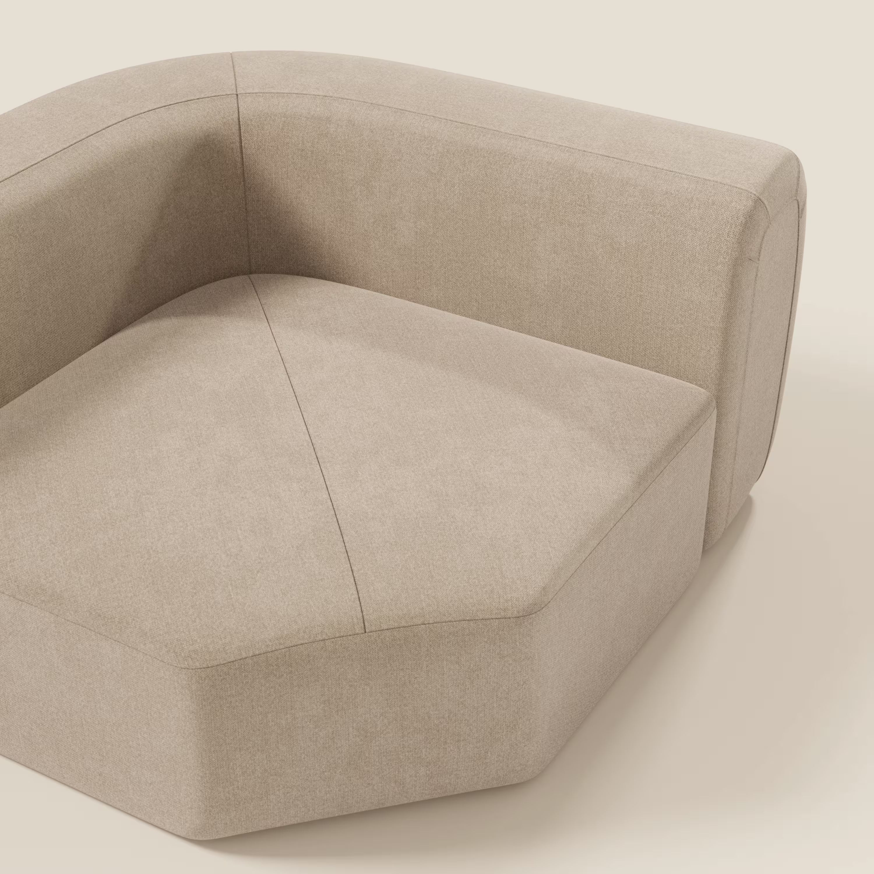 Una vista ravvicinata dall'alto di Bonbon Modulo angolare di Divani.Store: un moderno componibile angolare in tessuto lavabile T23 beige, dal rivestimento liscio e dalle linee geometriche pulite, che evidenzia il suo stile minimalista su uno sfondo chiaro.