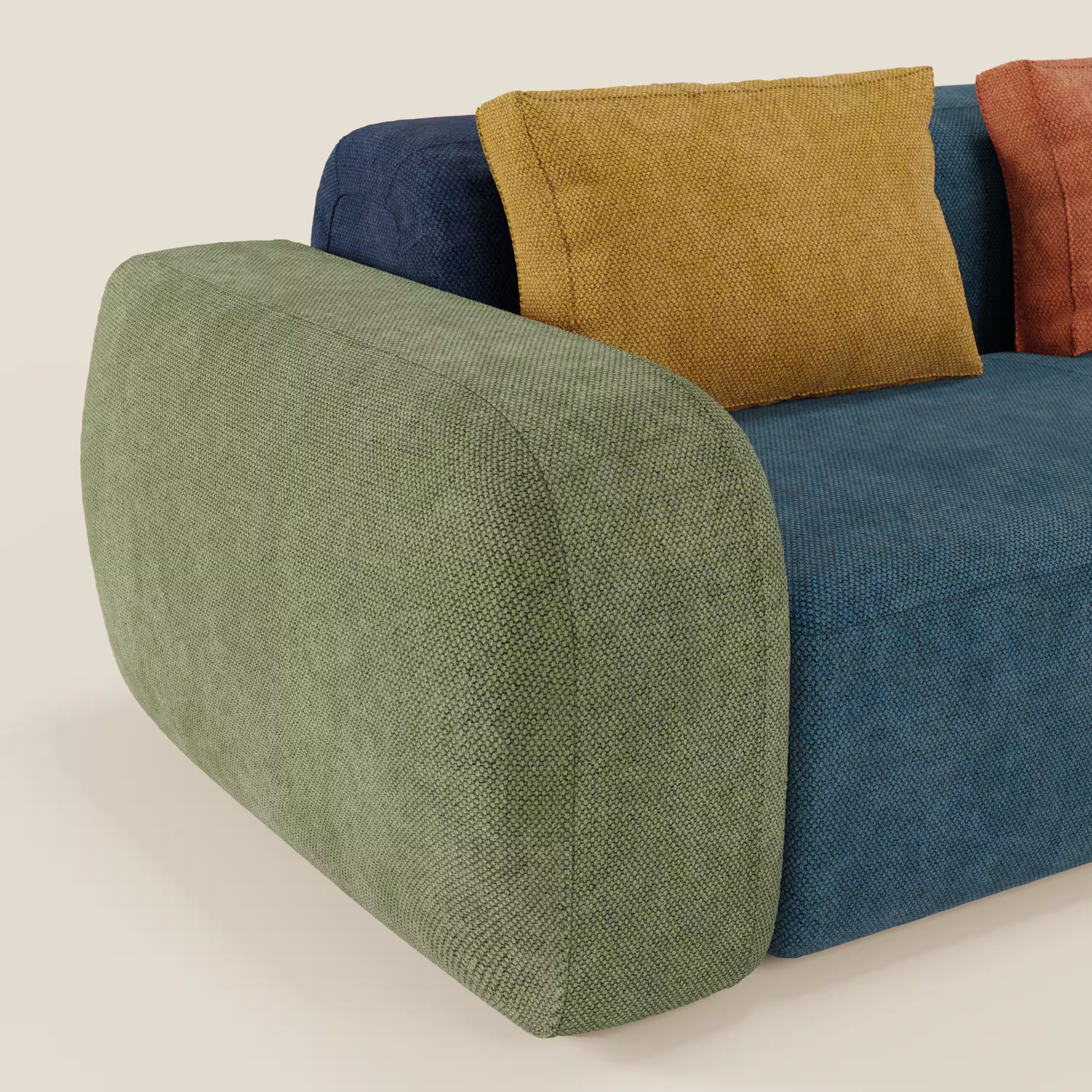 Il divano componibile BonBon 4 posti - edizione Grande Fratello di Divani.Store è caratterizzato da un moderno design modulare, bordi arrotondati, bracciolo verde, seduta e schienale blu e tre cuscini testurizzati gialli e ruggine. Artigianato italiano per una vita contemporanea.
