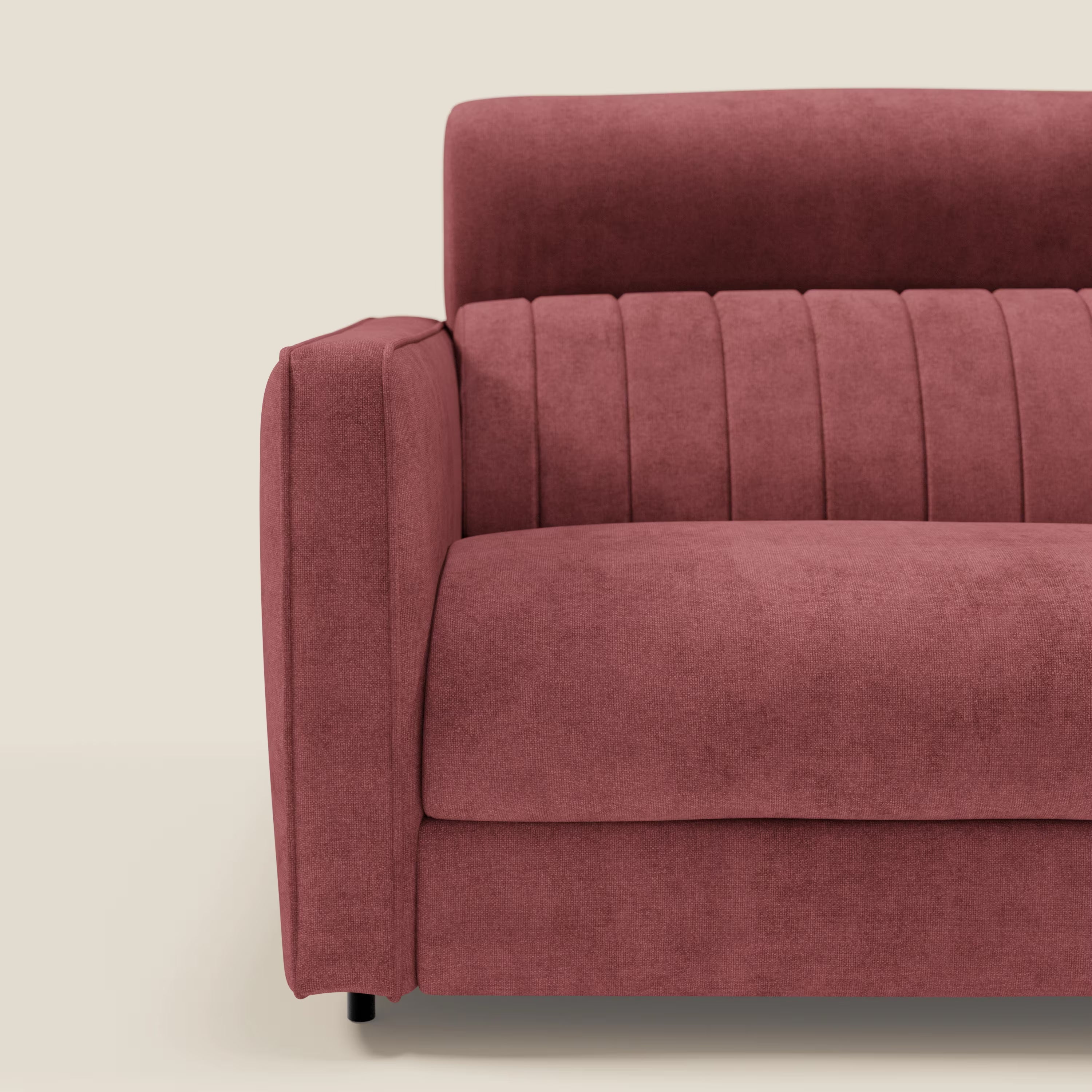 Il Nivon Divano letto moderno di Divani.Store è dotato di un materasso H16 cm, di un poggiatesta regolabile e di un rivestimento in tessuto impermeabile T25 rosso, che unisce l'eleganza italiana al comfort moderno.