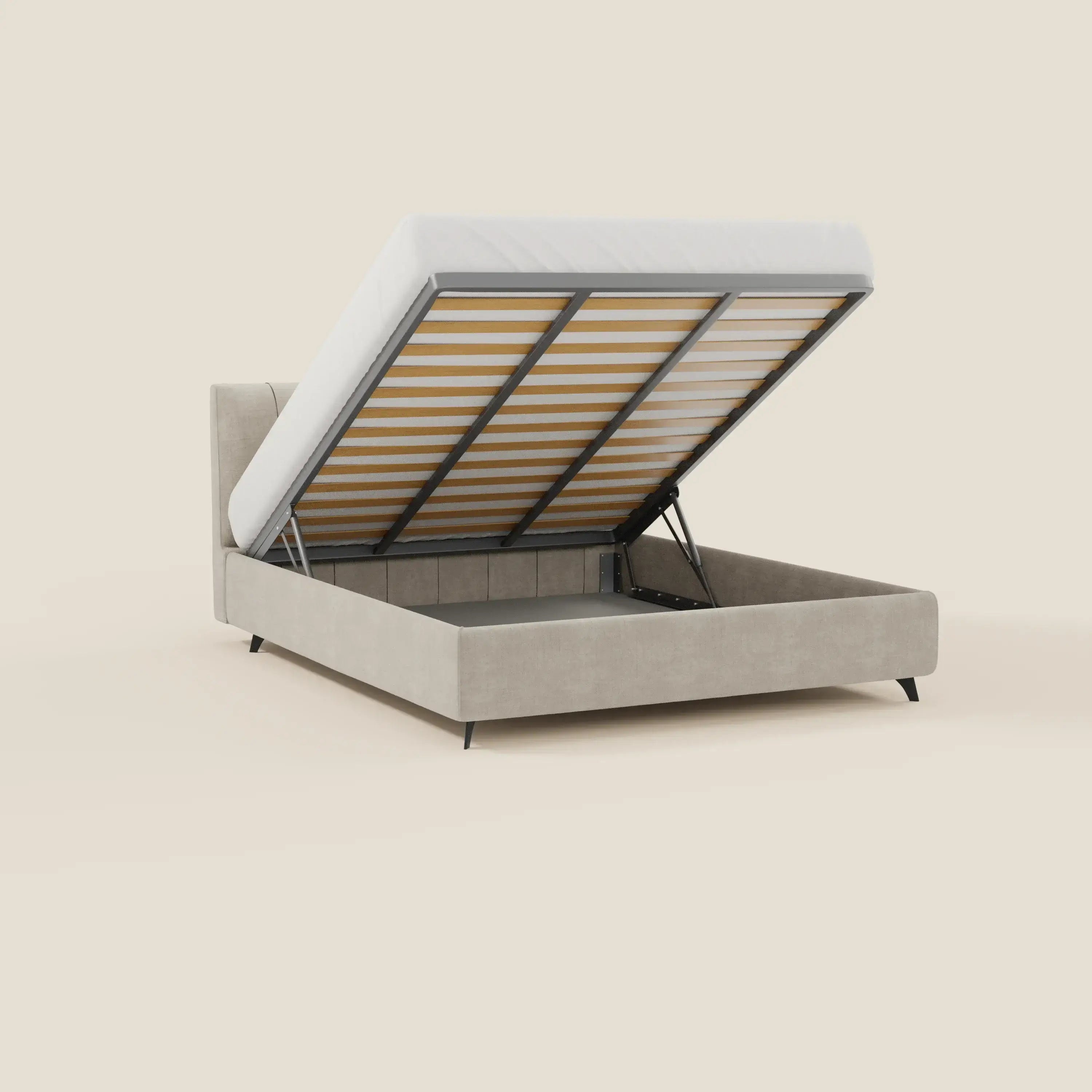 Il letto contenitore Bogart Edizione Grande Fratello di Letti.store è dotato di una piattaforma per materasso sollevabile con ampio spazio di contenimento, di una robusta struttura in metallo con doghe in legno e di un tessuto T22 panna sfoderabile e antimacchia, per uno stile italiano elegante e pratico.