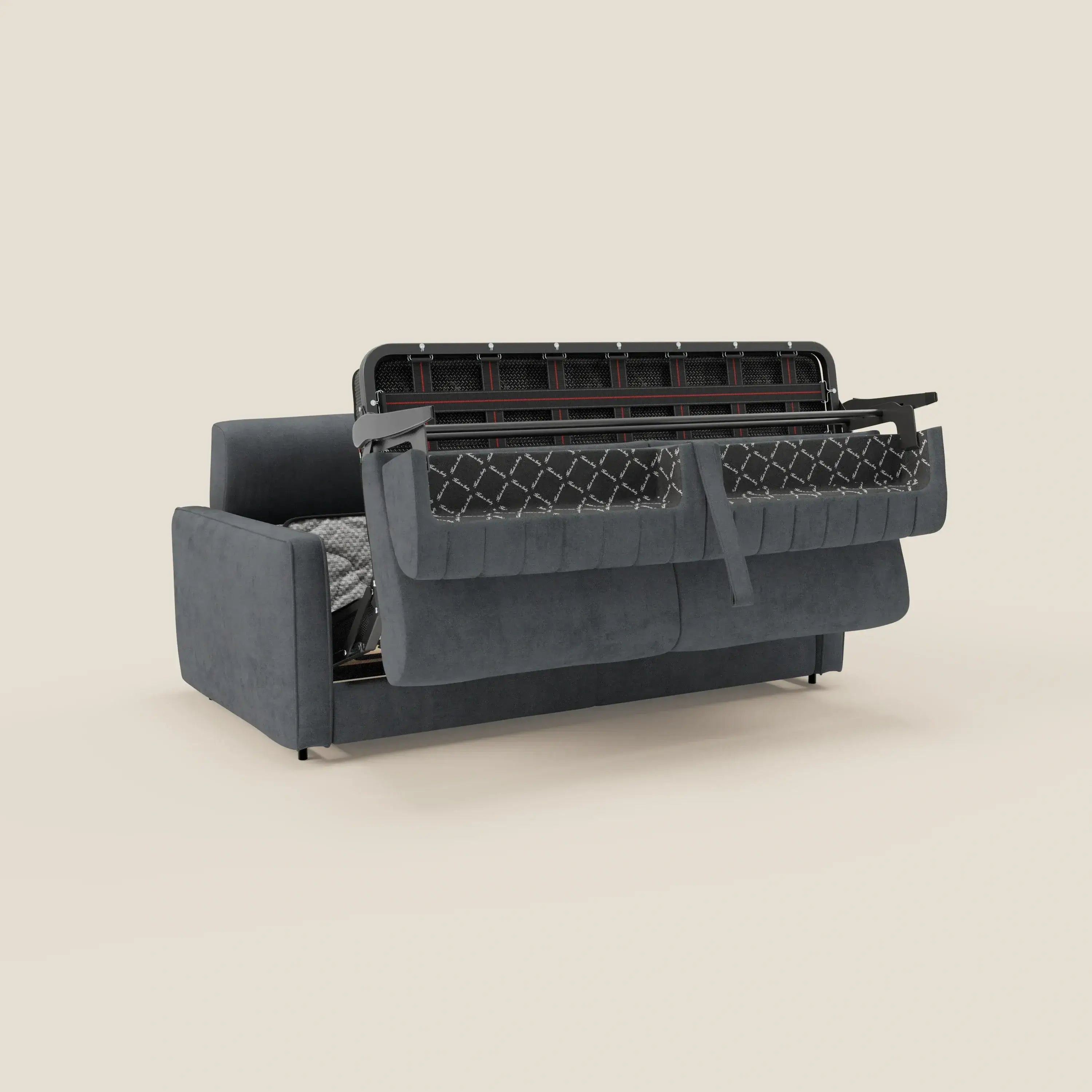 Il Nivon Divano letto moderno di Divani.Store in tessuto impermeabile T25 antracite è caratterizzato da un materasso pieghevole H16 cm e da un poggiatesta regolabile, che unisce design moderno e comfort su uno sfondo beige.